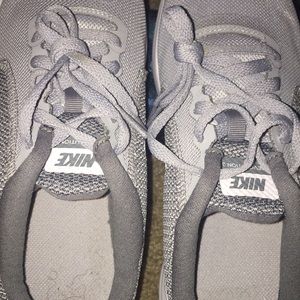 Gray Nike Revolution 3 shoes